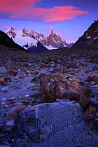 Rocks deposited by the glacier below Cerro Torre peak (3102 m) at dawn, Los Glaciares National Park, Andes, Patagonia, Argentina