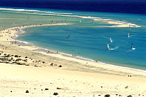 Swimmers and windsurfers on the Playa de Sotavento, Jandia NP, SE coast of Fuerteventura, Canary Islands