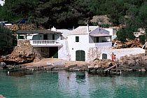 Traditional fisherman's house at Cala Binisafuller, Menorca, Spain