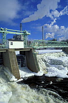 A hydropower dam on the Androscoggin River, which provides power for the paper mill in Berlin, New Hampshire, USA