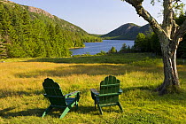 Chairs on the lawn of the Jordan Pond House, Mount Desert Island, Acadia National Park, Maine, USA.