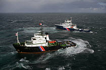 Tugs "Abeille Bourbon" and "Abeille Flandre" arriving at Brest, Brittany, France, April 2005.