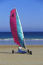 Land-sailing / sail-carting  (Char à voile) training on the beach at surf school in Saint-Malo, Brittany, France, 2000.