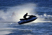 Two jet skis underway in Brest Harbour, Brittany, France 2000.