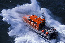 Loctudy SNSM (Societe Nationale des Secours en Mer) lifeboat "Margodig" powering through waves. Brittany, France 2002.