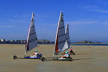 Sail-carting / land sailing ("Char à voile") on Le Sillon beach, Saint-Malo, Ile et Vilaine department of Brittany, France 2000.