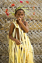 Young boy in traditional dress. Dance performance by villagers of Bodaluna Island (also known as Budi Budi) in Woodlark / Laughlan Islands, Papua New Guinea May 2008
