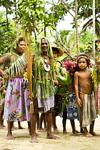 Villagers greet tourists at village tour and dance performance, Nembao Village, Utupua Island, Solomon Islands May 2008
