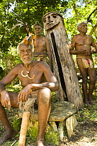 Village elders with traditional drum performing for tourists, Rano Island, Vanuatu May 2008