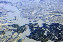 Aerial view of the ice road in the tundra connecting the gold mines to the city of Yellowknife, Northwest Territories, Canada