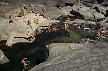 People bathing at So Miguel River in Vale da Lua (Valley of the Moon) Chapada dos Veadeiros, municipality of Alto Paraso de Gois, Gois State, Central Brazil.