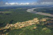 Aerial view of destruction of bodies of water and  rainforest caused by diamond mining, on the shore of Madeira River, Western Rondônia State, Western Brazil.
