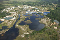 Aerial view of deforestation caused by diamond prospecting / mining in the Amazon upland rainforest, Northwestern Mato Grosso State, Western Brazil.