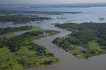 Aerial view of Paracuúba channel that connects the Soilimões River to the Negro River, before the meeting of the waters, near Manaus city, Amazonas State, Northern Brazil.