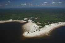 Aerial view of Amazon black water lake and Amazon rainforest near Nova Olinda do Norte town, Amazonas State, Northern Brazil.