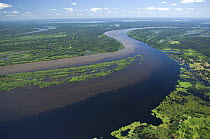 Aerial view of the meeting of the brown waters of River Mamoré and the black waters of River Guaporé / Itenez during the great flood of 2008, at the border of Brazil (Rondônia State) and Bolivia (B...