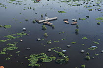 Aerial view of houses at the periphery of Trinidad city, capital of the Beni Department, during the 2008 flood of Mamoré River, Bolivia.