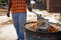 Smelting scrap aluminium, The Gambia, 2008