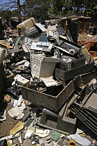 Dump of scrapped electronic equipment, stripped of recyclable parts, The Gambia, 2008