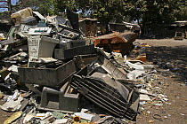Pile of scrap electronics stripped of recyclable parts, The Gambia, 2008