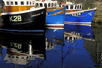 Fishing boats in Stromness harbour, The Orkney Isles, Scotland, UK