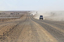 Trucks on track through Central Australia Desert, Northern Territory, Australia