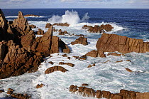 Strong waves at Cape Woolamai's Pinnacles, pink granite sculptured by rain and sea, Phillip Island, Victoria, Australia