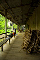 Tourist lodge with Ratan ladders used for climbing in the Gomantong caves, River Sungai Kinabatangan, Sabah, Borneo, Malaysia . 2007