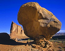 A balanced rock near the Tower of Babel in Arches National Park, Utah, USA.