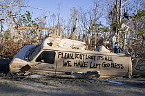 Note written by Hurricane Katrina victims on vehicle damged by hurricane, Gulfport, Mississippi, USA. August 2005