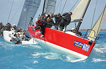 Melges 32 "Nightmare" rounding the windward mark during a race at the 2009 Acura Miami Grand Prix, day 3, 7th March.