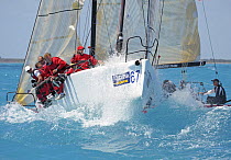 Melges 32 "Red" tacking at the windward bouy during a race at the 2009 Acura Miami Grand Prix, day 3, 7th March.