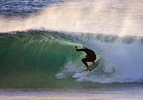 Surfing through a tube in South Africa. December 2008.