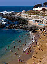 People enjoying the beach in Valparaiso, Chile, 2008.