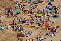 Sunbathers enjoying the beach in Valparaiso, Chile, 2008.