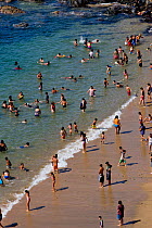 People swimming and paddling in Valparaiso, Chile, 2008.