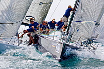 Attending to the foresails during close racing at the Acura Miami Grand Prix, March 2008.