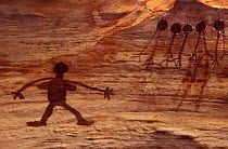 Aboriginal rock art, Woman sorcery figure and yams, Australia