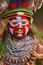 A woman from Western Highlands Province in ceremonial dress with painted face, Mount Hagen, Western Highlands Province, Papua New Guinea. September 2004
