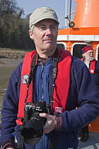 Photographer, Rob Cousins, on lifeboat photographing the Avon River Cornish Pilot Gig Race, Bristol, March 21st 2009.