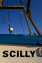 Local fishing boat "Lowena" pulled up behind Old Quay beach, St. Martin's, Isles of Scilly. December 2008.