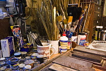 Paints, tools and brushes in Malcolm Darch's workshop, Salcombe, Devon, UK. January 2009.