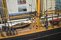 Close up of tender on deck of 'Salcombe fruiter' schooner "Brizo" model made by Malcolm Darch in his workshop, Salcombe, Devon, UK. January 2009.