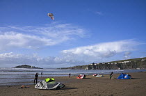 Kite surfers on Bantham Bay, with Burgh Island in the distance. South Devon, UK, January 2009.