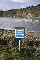 "Dangerous Cliffs: No Access to Beach" warning sign, Bantham Bay, South Devon, UK. January 2009.