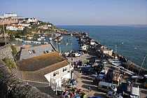 Mens crews preparing in the Old Harbour for Cornwall County Pilot Gig Championships, Newquay, September 2008.