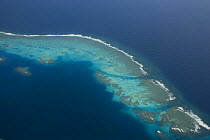 Aerial view of fringing coral reef off Ha'apai islands, Tonga, Melanesia, Pacific