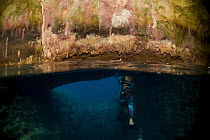 Snorkeler in hidden underwater cave of Nuapapu, Tonga, Melanesia, 2007   .