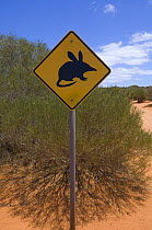 Sign warning travellers of Bilbies {Macrotis sp} on Peron Road, Francois Peron National Park, Western Australia, November