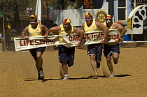 Participants in the annual Henley-on-Todd yachting and boat regatta held in the dry bed of the Todd River, Alice Springs, Northern Territory, Australia, August 2007